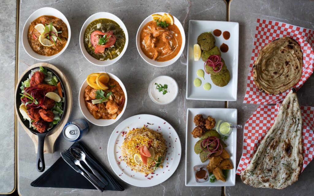 A colorful assortment of rice dishes including pulao biryani and kheer - Celebrating festivals