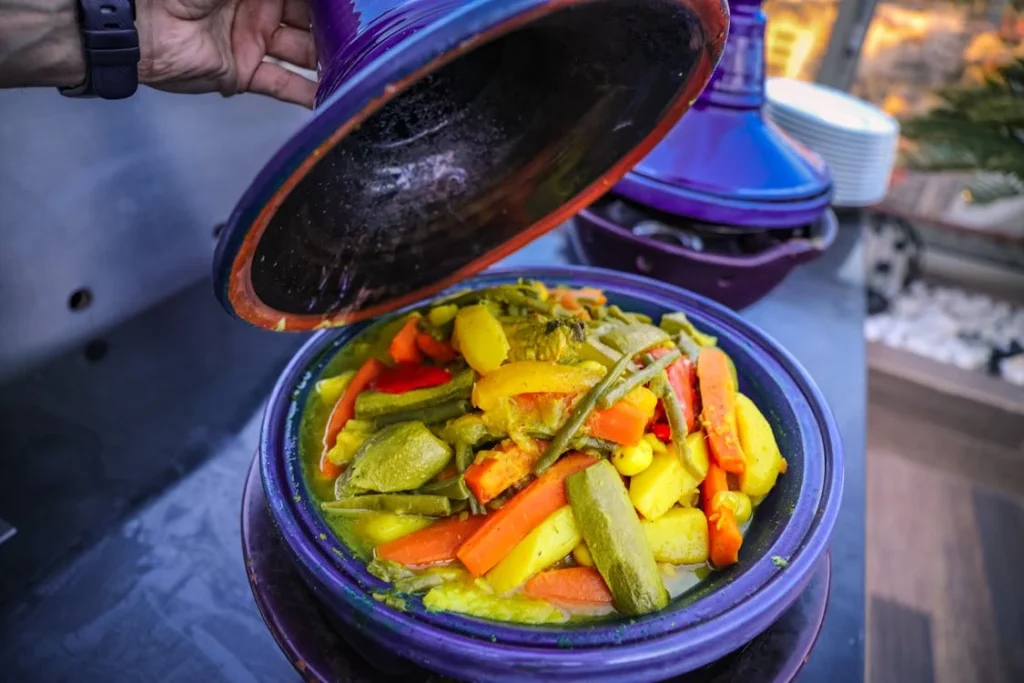 A cooking scene where spices are being added to a pot or dish - spice mix recipes