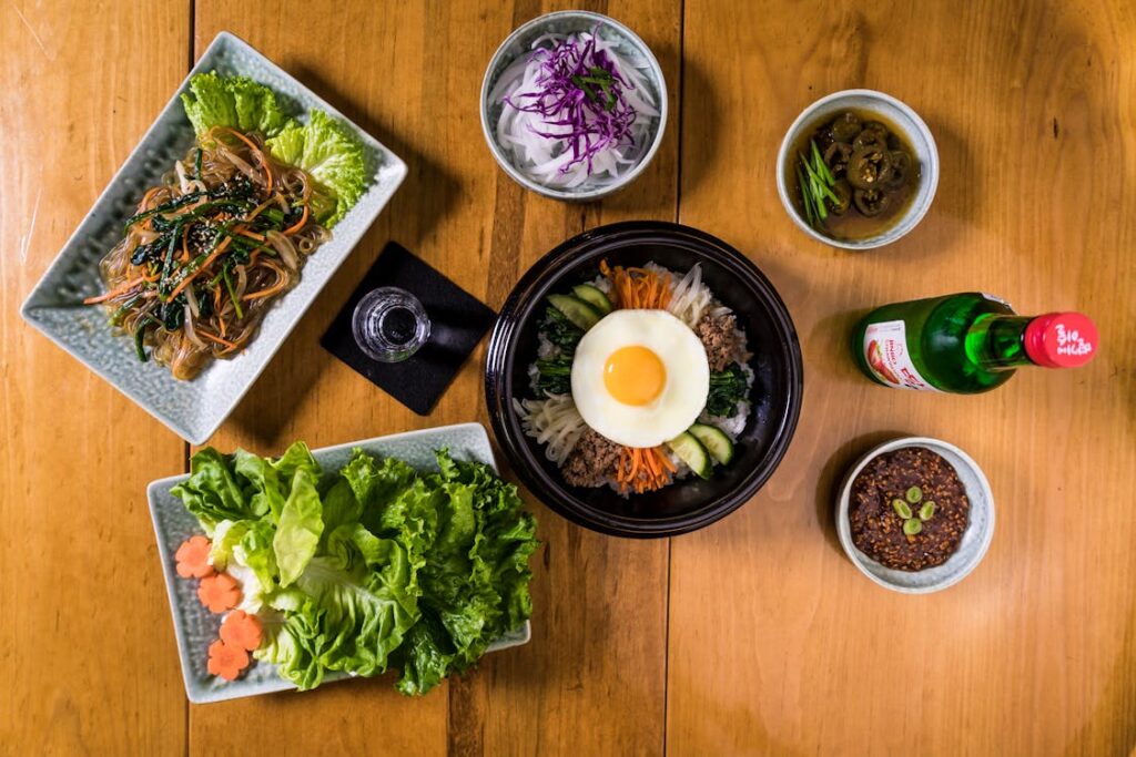 A flat lay image of various spices in bowls with a variety of colors and textures - spice mix recipes